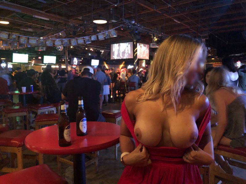 Naked saleswoman in a store