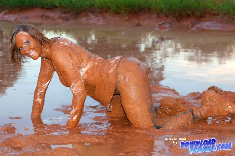 Girl in mud without clothes