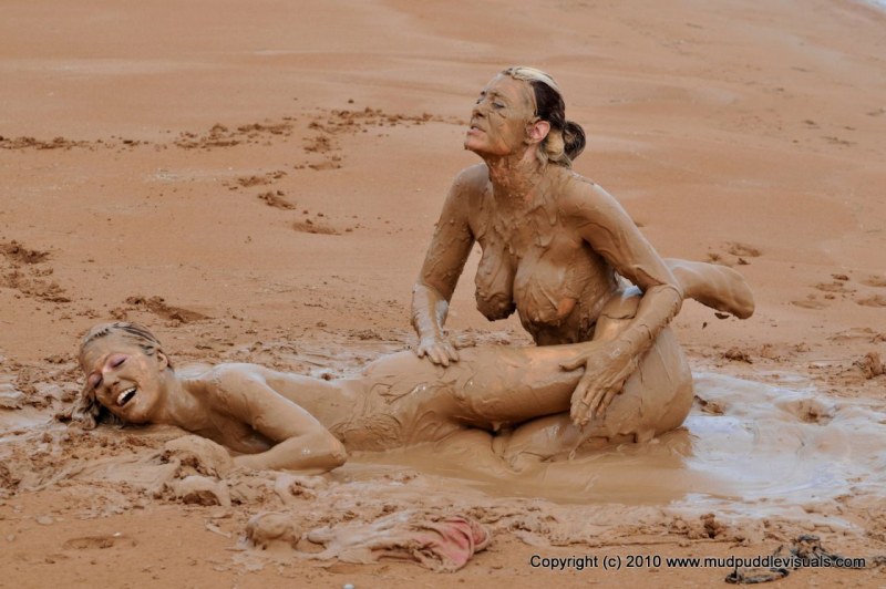 Naked mature women in mud