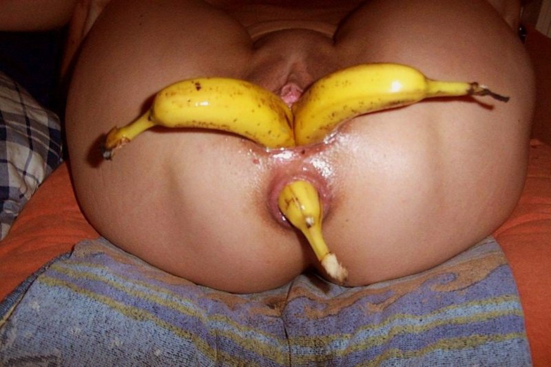 The girl put two bananas in herself