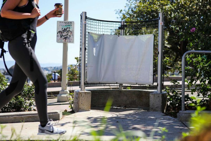 Woman squatting in the toilet