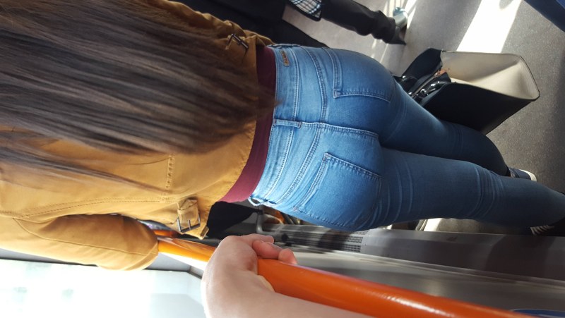 Photo of a girl with the hands of men under a skirt