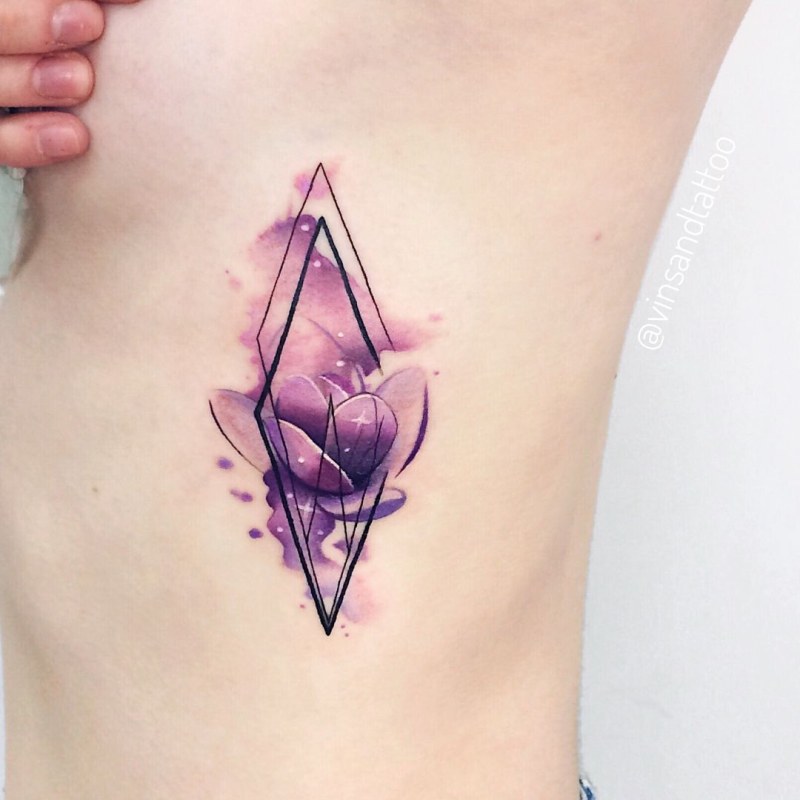 Geometric watercolor tattoos