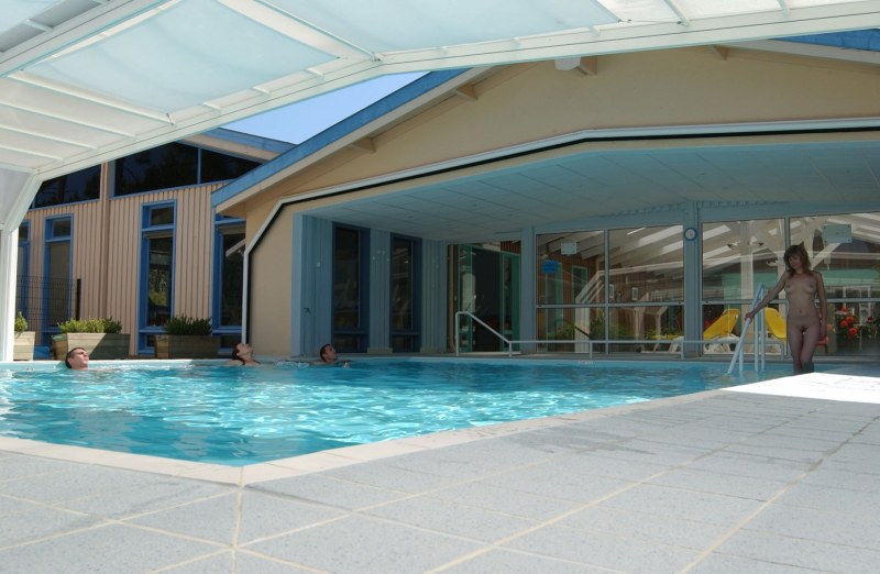 Guy and girl stand topless