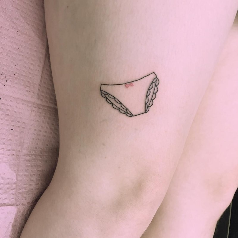 Tattoo on the seam from Caesarean horizontal