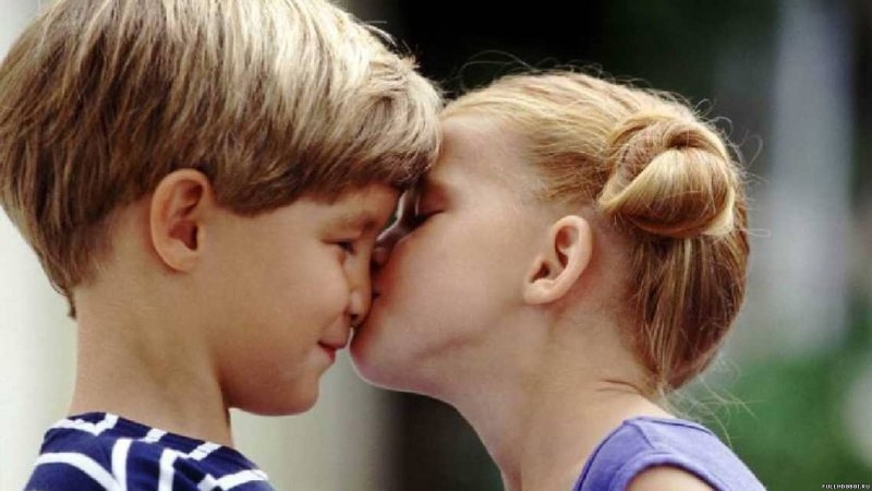 Children's kiss on the lips 12 years old