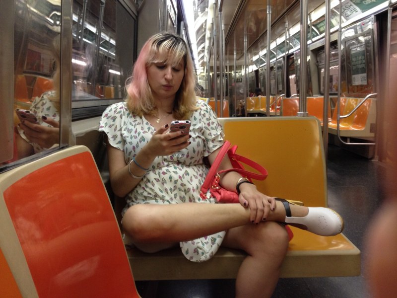 Woman Spreading Subway