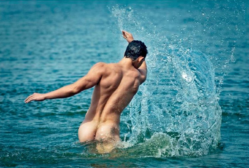 Beautiful naked guys at sea