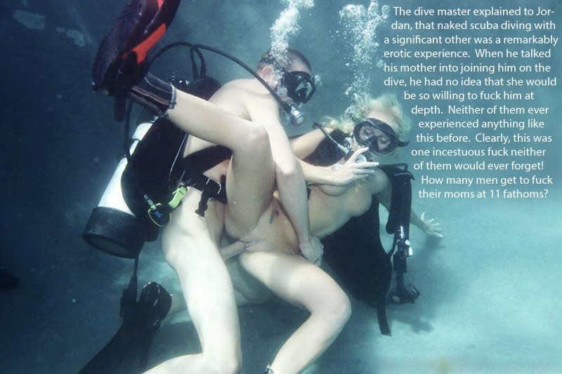 Naked women with flippers underwater