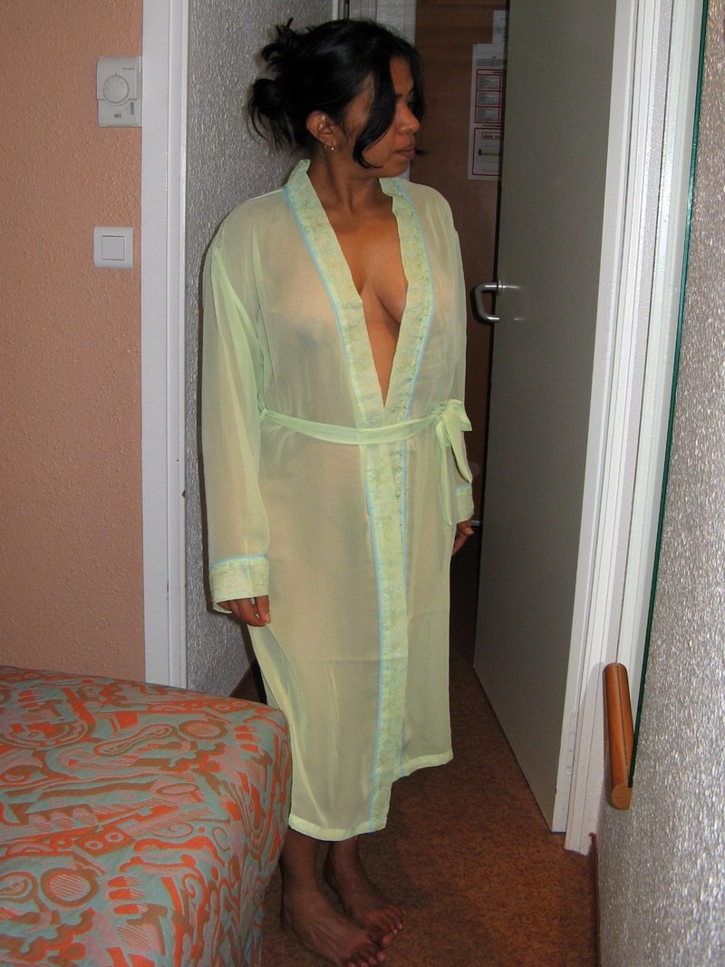 Adult women in a dressing gown without panties