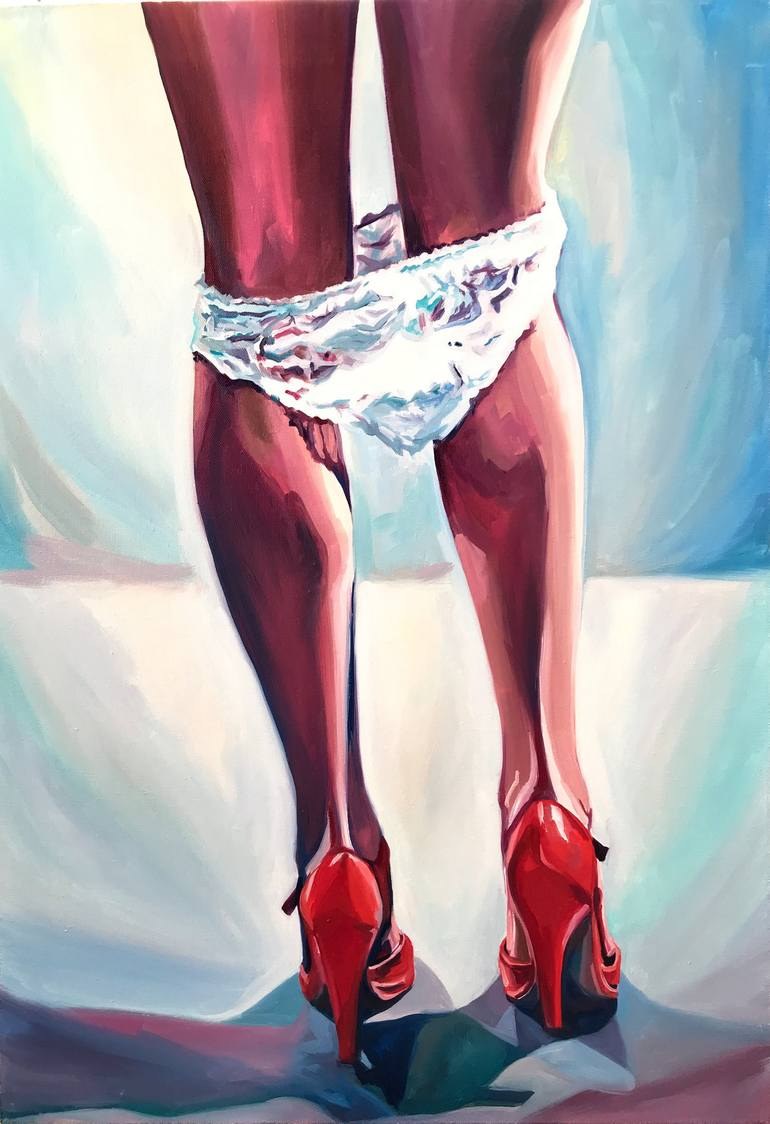 Labia peep out from under the short