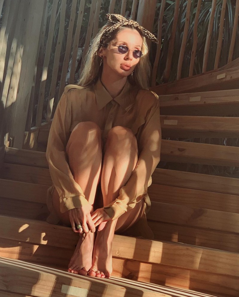 Girlfriends on the beach kiss