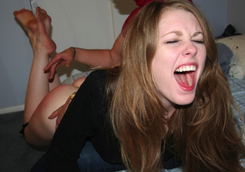 The face of the girl when flogging