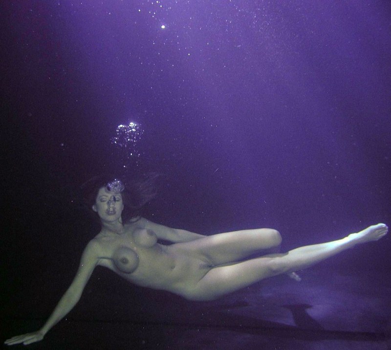 Naked girls in transparent water