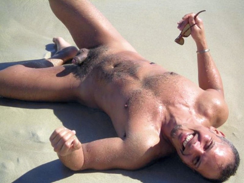 Beautiful naked men on the beach