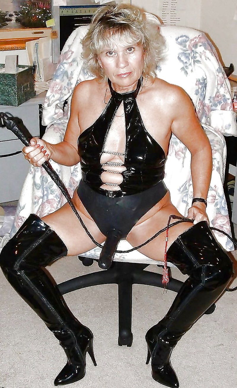 Girl in stockings with strapon