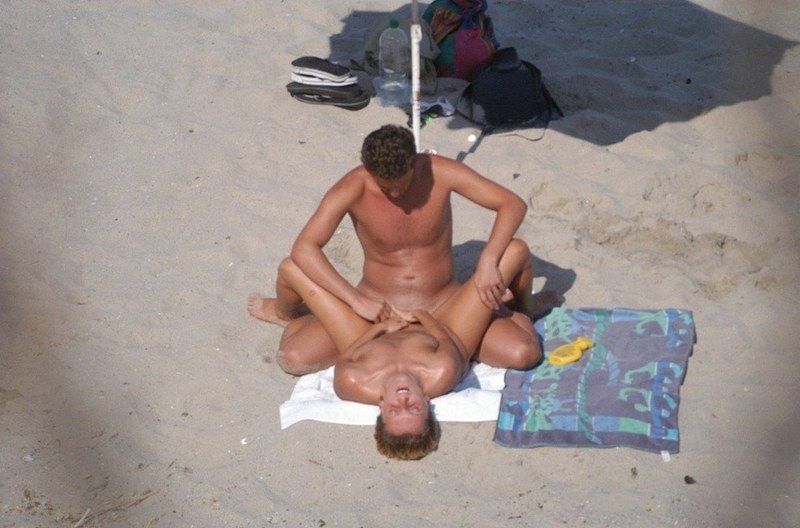 Fuck on a public beach