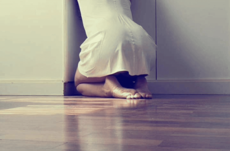 The girl washes the floors