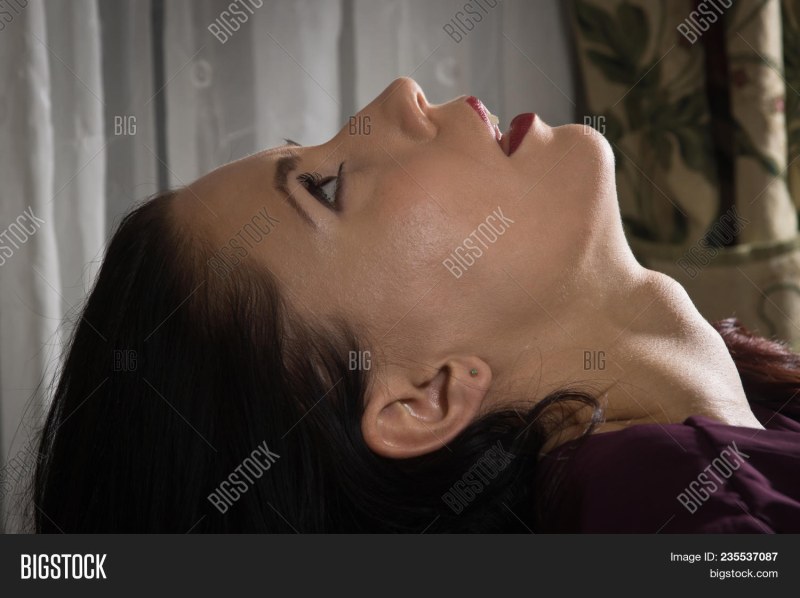 Woman strangles a man photo