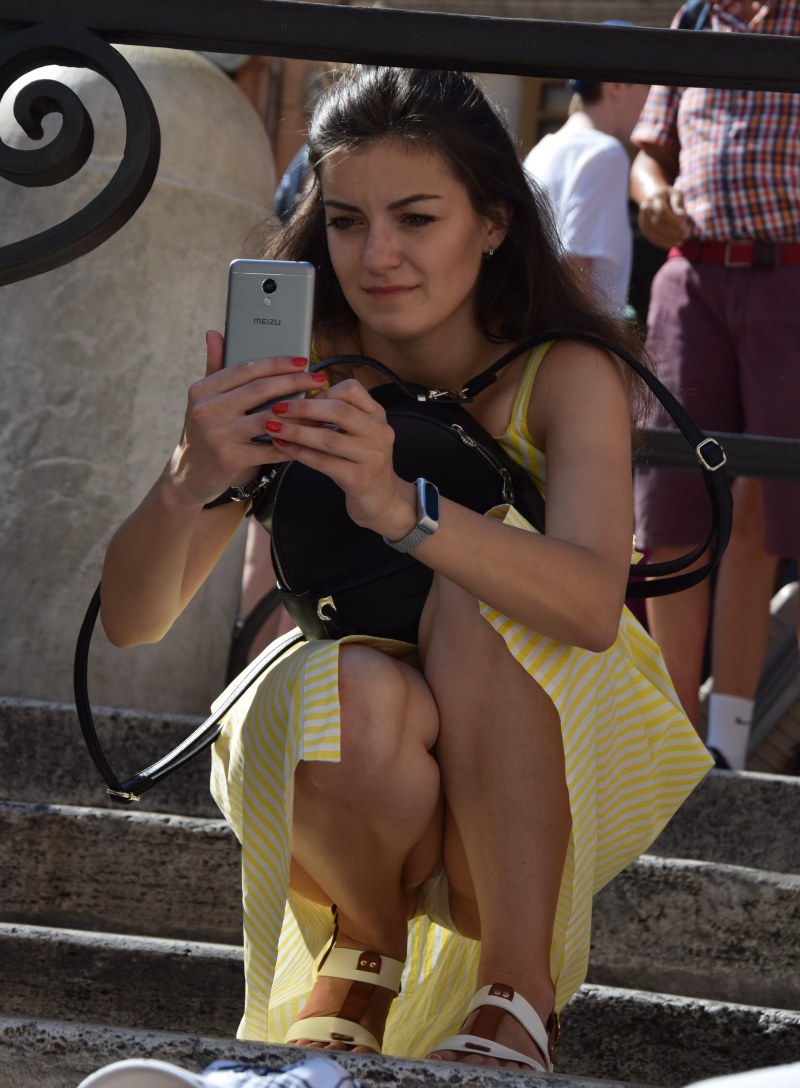 Elizabeth Olsen lifted up a dress