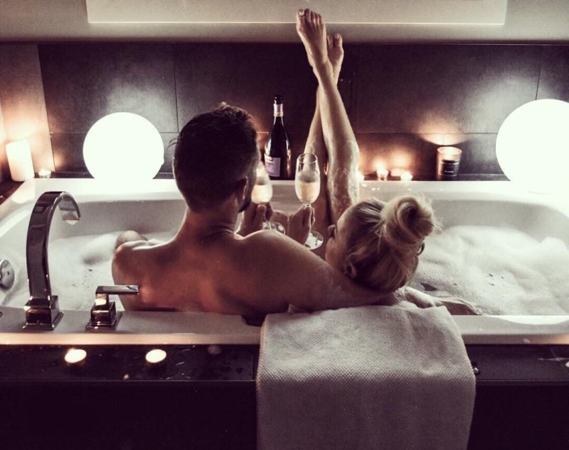 A guy with a girl in a bath