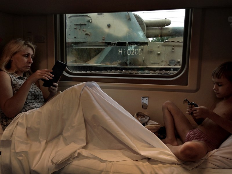 The girl undresses on the train