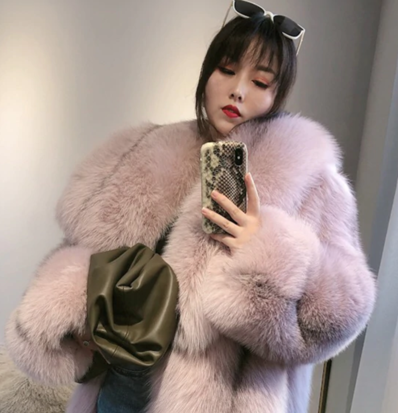 Luxurious woman in a fur coat