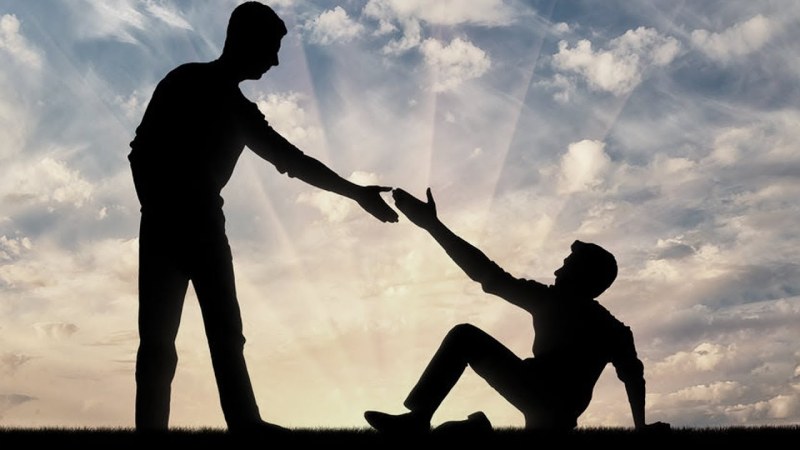 A person extends a helping hand