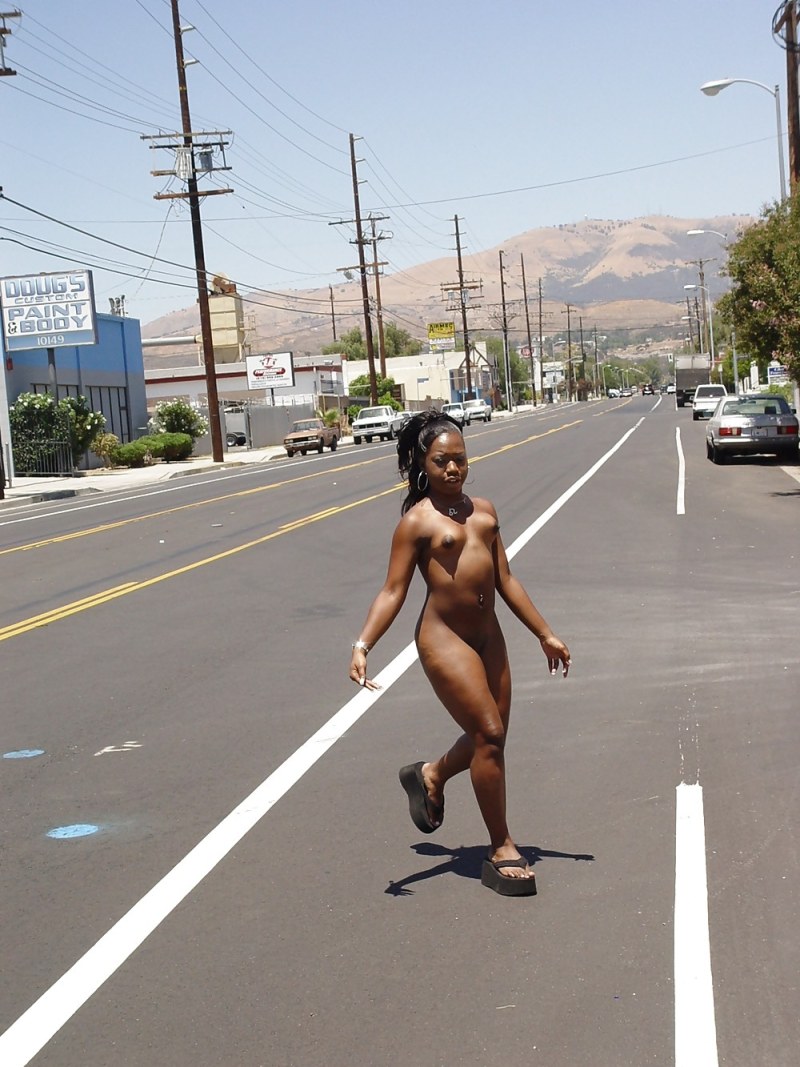 Naked on the street among people