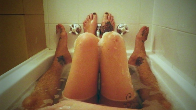 Guy and girl in a jacuzzi