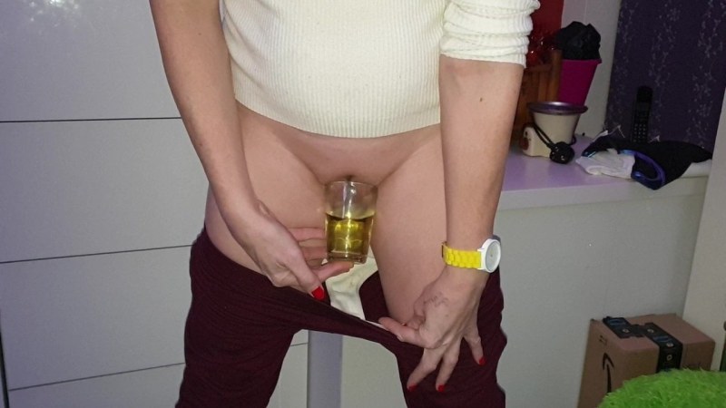 Trance girl pisses in a glass