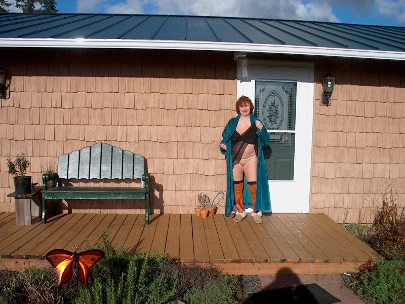 Adult naked women in a dressing gown