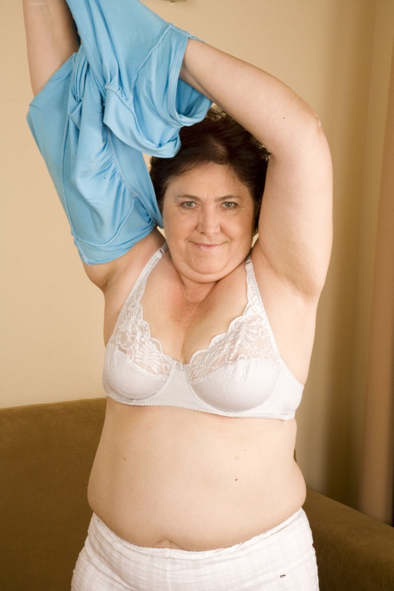 Old women in a bra and underpants