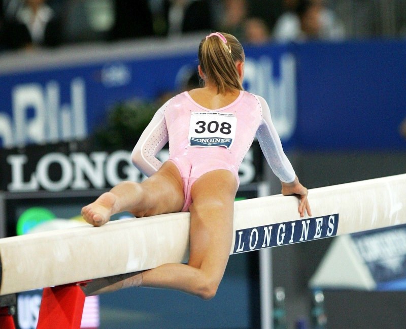 Asses of gymnasts in a swimsuit