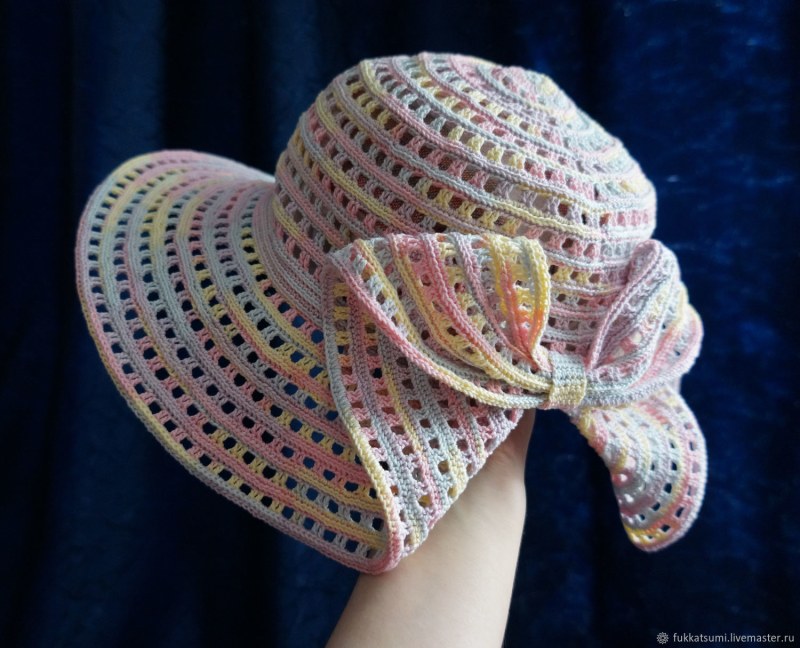 Hat with a whole liable bow