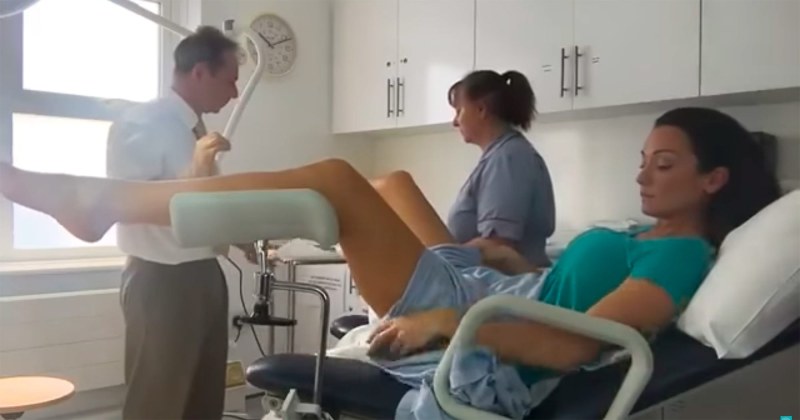 Naked pregnant women by a gynecologist