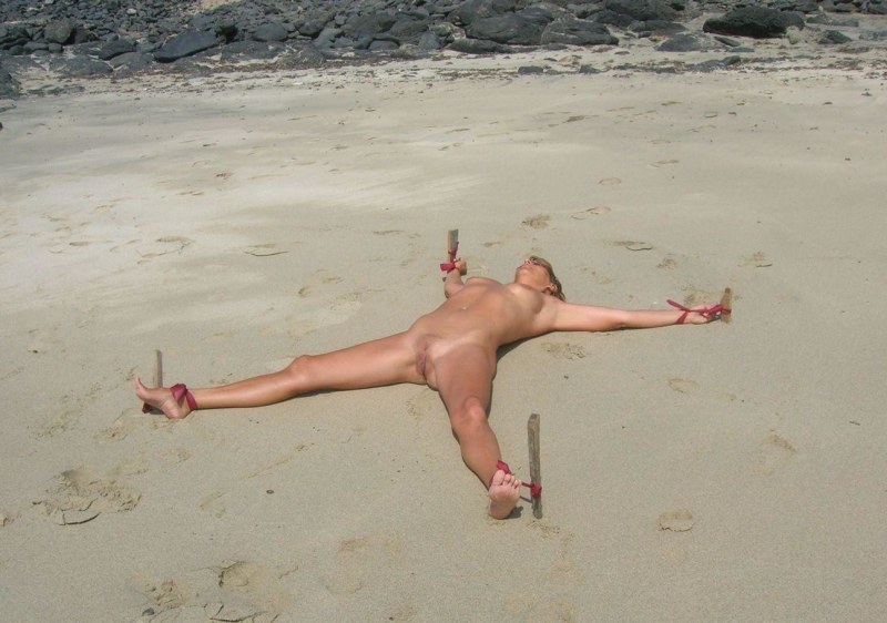 Naked woman BDSM at sea