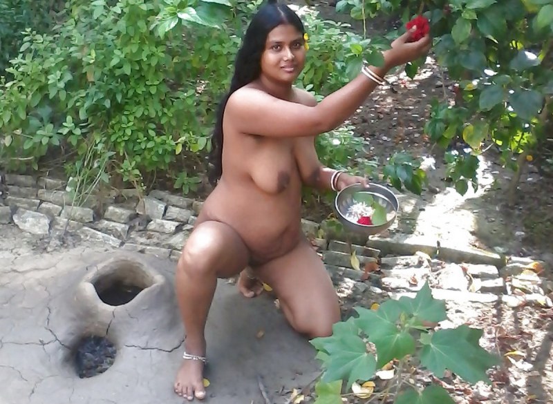 Indian women bathe