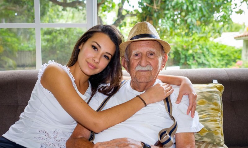 Grandfather with young girls