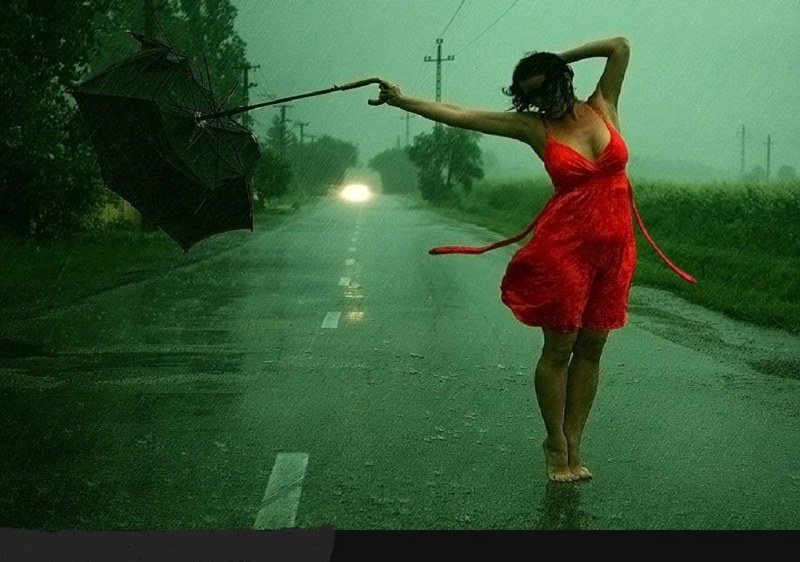 The girl is in the rain