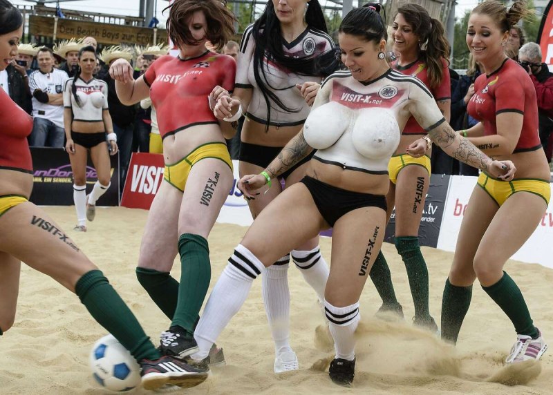 Naked in football uniforms