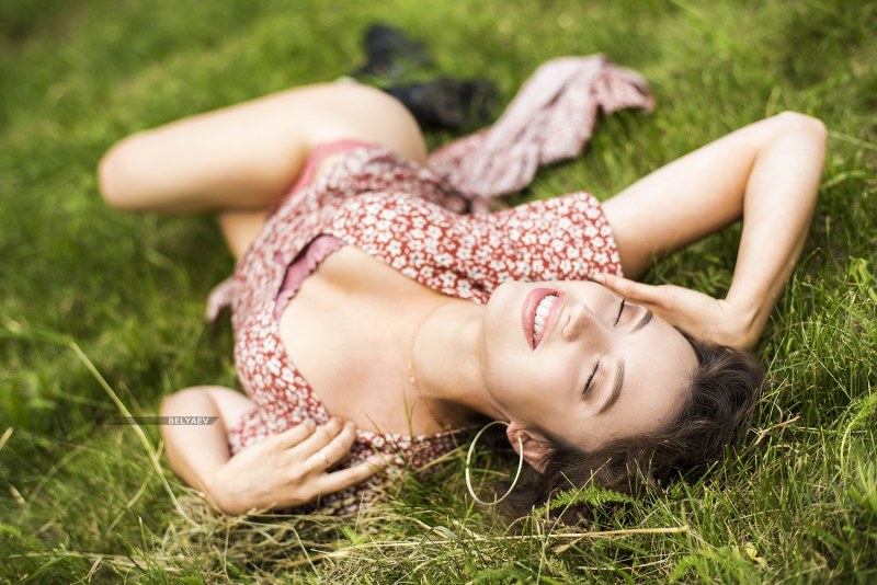 Girl lies in the field