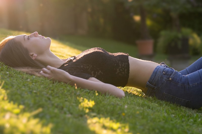 Girl on the grass from above