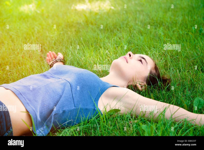 The girl lies barefoot