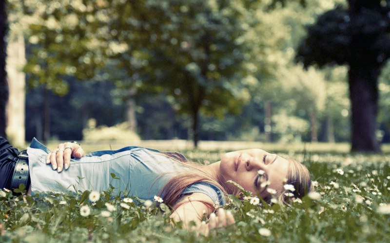 Bosya girl lies on the grass