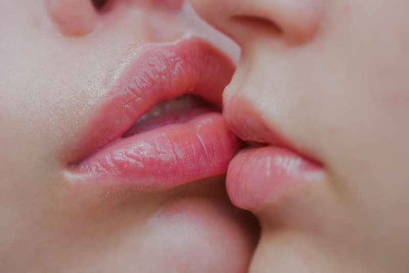 Wet kiss on the lips