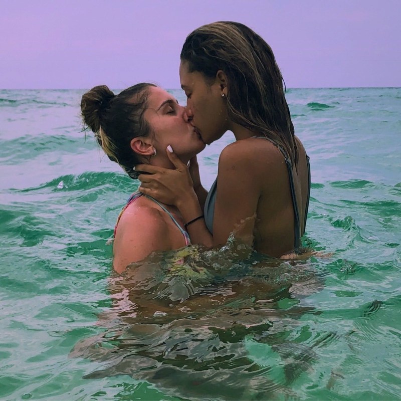 Kiss two girls on the beach