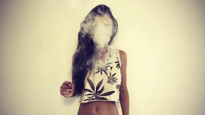 Girl on the background of hemp