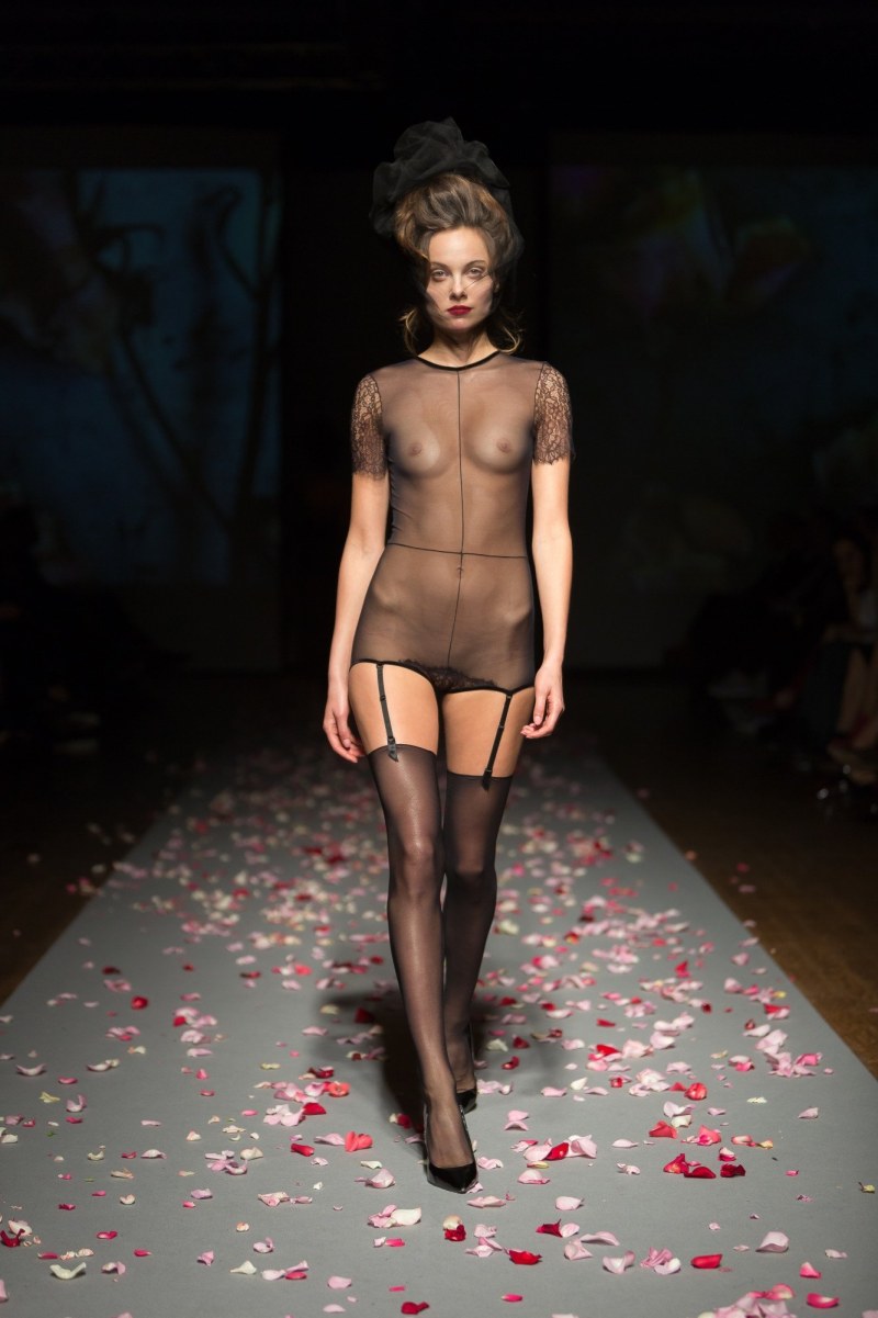 Fashion show with bare breasts