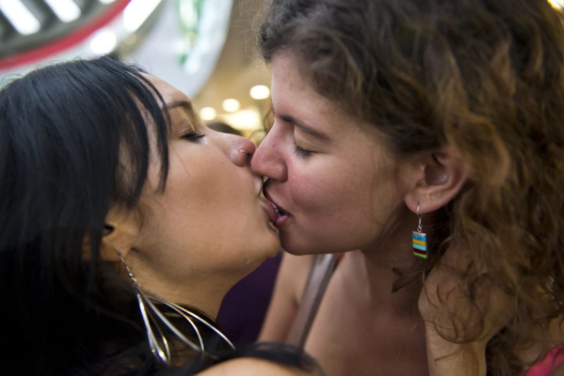 Adult women kiss